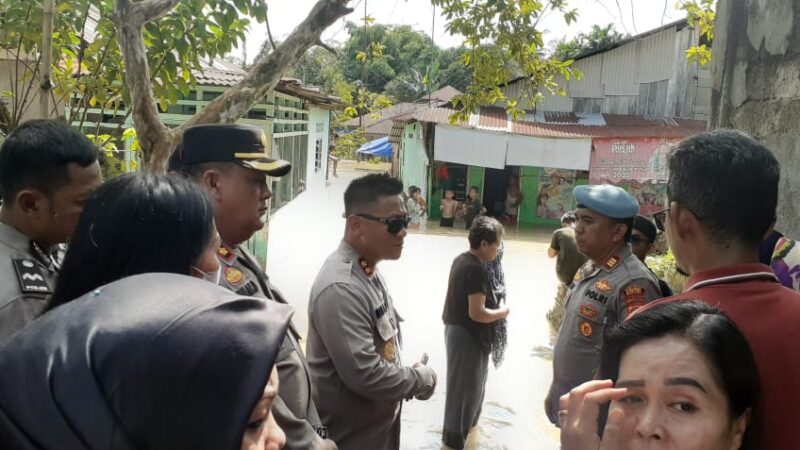 Kapolres Binjai AKBP RIO ALEXANDER PANELEWEN, S.I.K Turun Langsung Dilanda Banjir Sungai Mencirim kec.Binjai Kota dan Binjai Selatan