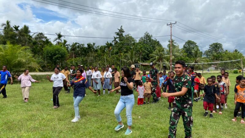 Tumbuhkan Kekompakan Dan Semangat Anak-anak di Perbatasan Papua Satgas Yonif 122/TS Menggelar Senam Bersama