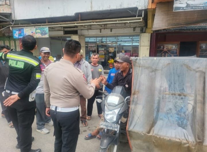 AKP HOTLAN SIAHAAN Bersama Tim KBO Sat Lantas Melakukan Kegiataan “Cooling System “