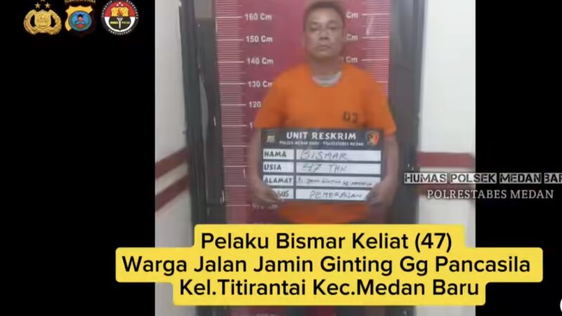 Personel Unit Reskrim Polsek Medan Baru mengamankan pelaku pemerasaan berinisial BK